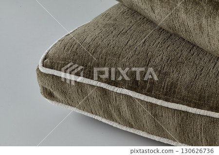 Close-up of soft furnishing fabric showing texture and detailing 130626736