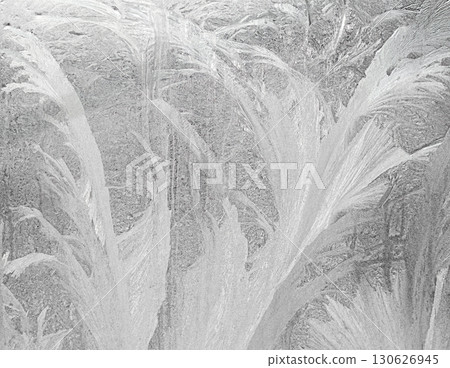 Abstract frosted glass texture with intricate icy patterns and cold tones Abstract frosted glass texture with intricate icy patterns and cold tones 130626945