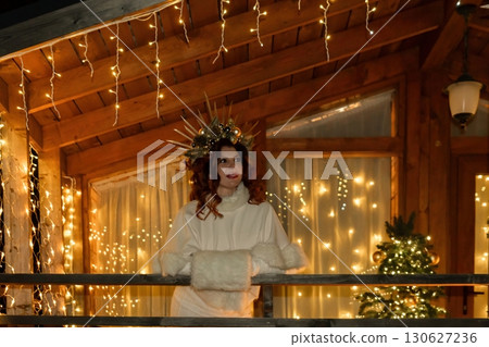 Woman Christmas Lights Porch Decorated Holiday Season 130627236