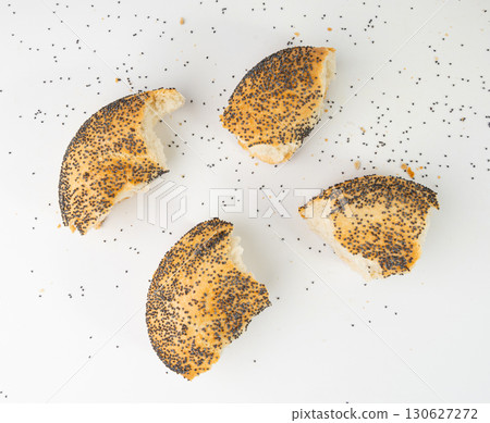 Broken Poppy Seed Bagel Isolated, Round Bread Bun, Poppyseed Wheat Bakery Pieces for Breakfast 130627272