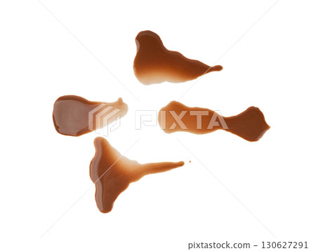 Spilled chocolate milk isolated, hot chocolate puddle, liquid stain, coffee splatter, brown latte 130627291