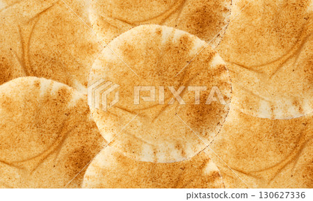 Pita flat bread wallpaper, wheaten pitta flatbread also known as Arabic bread pattern, chapati Pita flat bread wallpaper, wheaten pitta flatbread also known as Arabic bread pattern, chapati 130627336