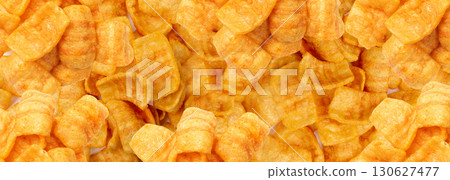 Bacon chips pattern, puff crisps wallpaper, puffs with spices, crunchy rice puffed snacks texture Bacon chips pattern, puff crisps wallpaper, puffs with spices, crunchy rice puffed snacks texture 130627477