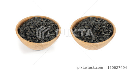 Sunflower seeds pile isolated, black oil sun flower grains group with shell, fresh edible oil seeds heap Sunflower seeds pile isolated, black oil sun flower grains group with shell, fresh edible oil seeds heap 130627494