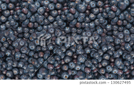 Blueberry texture background. Fresh blue berry fruits pattern, bilberry wallpaper with copy space Blueberry texture background. Fresh blue berry fruits pattern, bilberry wallpaper with copy space 130627495
