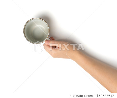 Empty Cup in Hands Isolated, Hand Holds Cup, Coffee Mug, Teacup, Hot Beverage Mockup, Grey Cup in Arms Empty Cup in Hands Isolated, Hand Holds Cup, Coffee Mug, Teacup, Hot Beverage Mockup, Grey Cup in Arms 130627642