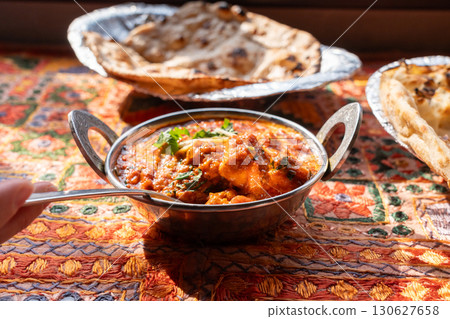 Butter paneer masala. Cottage cheese curry, hot spicy chicken korma, traditional indian food 130627658