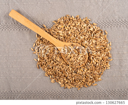 Milk thistle seeds, silybum marianum grains, dry blessed milkthistle fruits, variegated thistle kernels 130627665