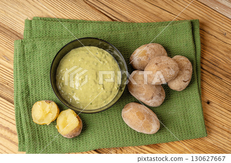 Red mojo rojo and green mojo verde sauces, traditional Tenerife dips, mojo picon dressing 130627667