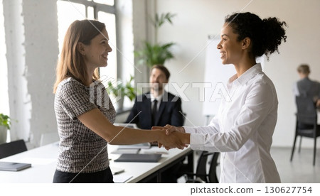 Business people shaking hands 130627754