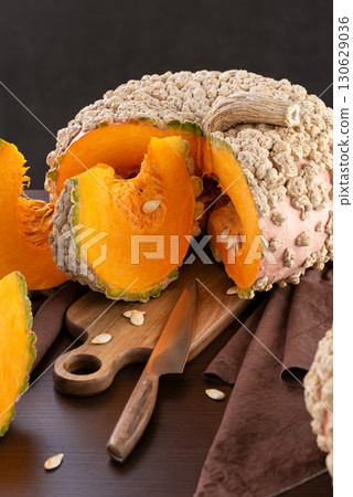 Peanut pumpkin Galeuse d Eysines And Wedges Prepared On Kitchen Table 130629036