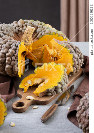 Cut Marina Di Chioggia Squash With Wedges On Table Cut Marina Di Chioggia Squash With Wedges On Table 130629038