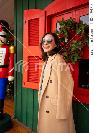 Woman walking sunny winter day European city 130629479