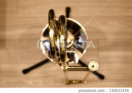 Top view of a trombone on a stand Top view of a trombone on a stand 130631456