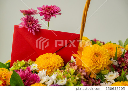 Red envelope gift present idea Flower delivery Autumn garden colorful flowers. Beautiful autumnal bouquet dahlia chrysanthemum. Red pink orange fall color fall floral background. Flower shop and Red envelope gift present idea Flower delivery Autumn garden colorful flowers. Beautiful autumnal bouquet dahlia chrysanthemum. Red pink orange fall color fall floral background. Flower shop and 130632205