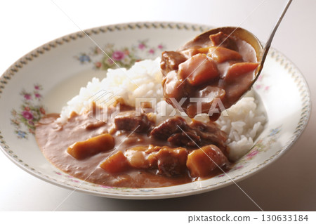 Regular curry rice served in a Showa-era Japanese floral dish Regular curry rice served in a Showa-era Japanese floral dish 130633184