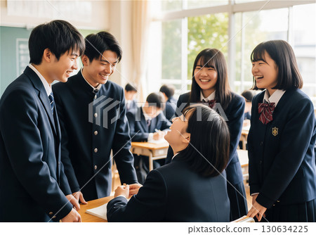 A moment of youth: Junior high school students chatting in a Japanese classroom 130634225