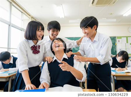A moment of youth: Junior high school students chatting in a Japanese classroom 130634229