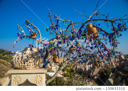 Valley of doves panoramic view near Uchisar castle in sunrise, Cappadocia Valley of doves panoramic view near Uchisar castle in sunrise, Cappadocia 130635310