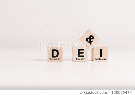 Business concept of diversity, equality, inclusion is symbol DEI written on wooden block, representing core values based on respect, fairness, equal opportunity. diversity, equality, inclusion Business concept of diversity, equality, inclusion is symbol DEI written on wooden block, representing core values based on respect, fairness, equal opportunity. diversity, equality, inclusion 130635474