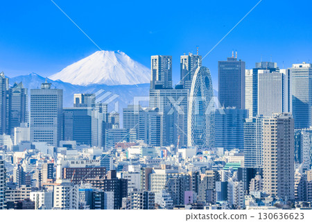 Mount Fuji towering over the cityscape 130636623