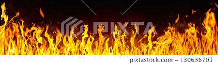 Dramatic red, orange, yellow flame and smoke rising against a dark background. Realistic, abstract fire burning background texture overlay. Vivid and hot hell or blazing fire wallpaper Dramatic red, orange, yellow flame and smoke rising against a dark background. Realistic, abstract fire burning background texture overlay. Vivid and hot hell or blazing fire wallpaper 130636701