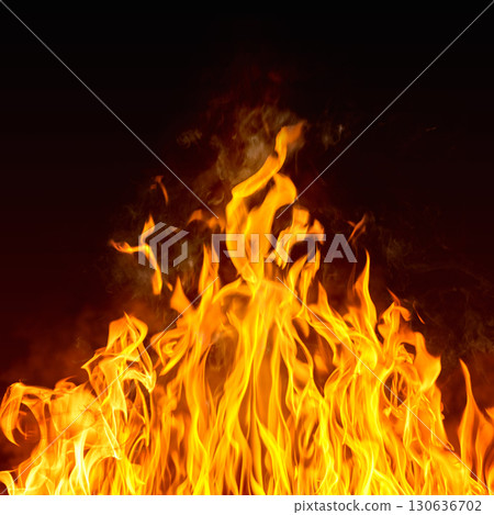 Dramatic red, orange, yellow flame and smoke rising against a dark background. Realistic, abstract fire burning background texture overlay. Vivid and hot hell or blazing fire wallpaper Dramatic red, orange, yellow flame and smoke rising against a dark background. Realistic, abstract fire burning background texture overlay. Vivid and hot hell or blazing fire wallpaper 130636702