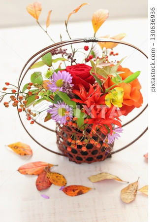 Autumn arrangement in a bamboo vase 130636936