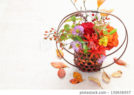 Autumn arrangement in a bamboo vase 130636937
