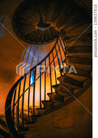 Warm-colored spiral staircase 130637818