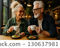 An elderly couple joyfully enjoying coffee and breakfast together in a cozy modern cafe. Generated AI. 130637981