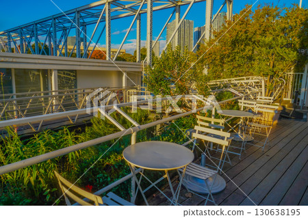 A cafe with a bridge and plants A cafe with a bridge and plants 130638195