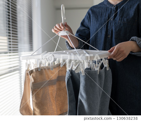 Woman doing housework Woman doing housework 130638238