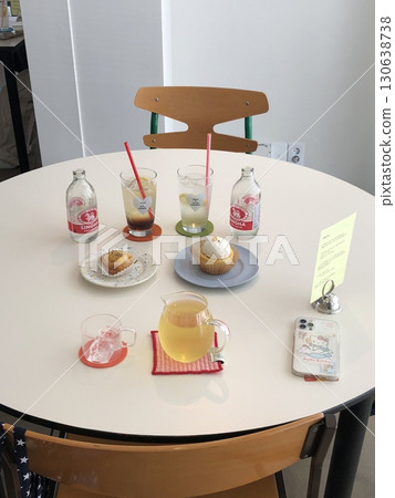 Light and creamy desserts with delicate layers, fresh fruits, and rich flavors, paired with refreshing sweet drinks. A perfect cafe treat for a delightful and indulgent experience. 130638738