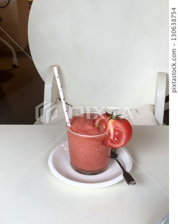 Refreshing tomato slushie with a blend of ripe, juicy tomatoes and ice, offering a perfect balance of natural sweetness, tangy flavor, and icy coolness in every revitalizing sip. Refreshing tomato slushie with a blend of ripe, juicy tomatoes and ice, offering a perfect balance of natural sweetness, tangy flavor, and icy coolness in every revitalizing sip. 130638754