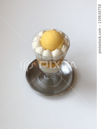 Luscious mango parfait layered with creamy yogurt, sweet mango chunks, and crunchy granola, offering a perfect balance of tropical freshness, smooth texture, and satisfying crunch in every spoonful. Luscious mango parfait layered with creamy yogurt, sweet mango chunks, and crunchy granola, offering a perfect balance of tropical freshness, smooth texture, and satisfying crunch in every spoonful. 130638758