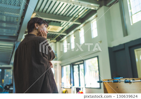 A room with a tabletop soccer game 130639624