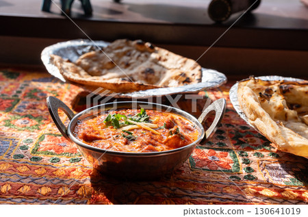 Butter paneer masala. Cottage cheese curry, hot spicy chicken korma, traditional indian food 130641019