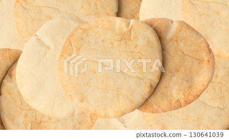 Pita flat bread wallpaper, wheaten pitta flatbread also known as Arabic bread pattern, chapati Pita flat bread wallpaper, wheaten pitta flatbread also known as Arabic bread pattern, chapati 130641039
