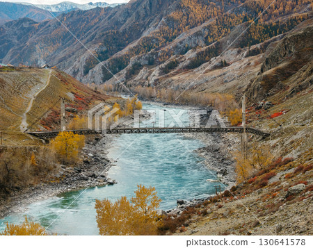 Ininsky suspension bridge is bridge over Katun River on Chuisky Tract highway. Ininsky Bridge is suspension bridge over Katun near Inya village Ongudai district, Altai Republic, architectural landmark 130641578