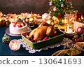Christmas dinner: roast chicken and strawberry cake 130641693