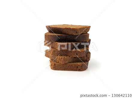 Black rye bread isolated, dark brown sliced loaf, sourdough borodinsky rugbrod square slices Black rye bread isolated, dark brown sliced loaf, sourdough borodinsky rugbrod square slices 130642110