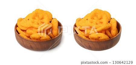 Corn puff snack isolated, crunchy cereal nosh, crispy yellow rice breakfast with paprika 130642129