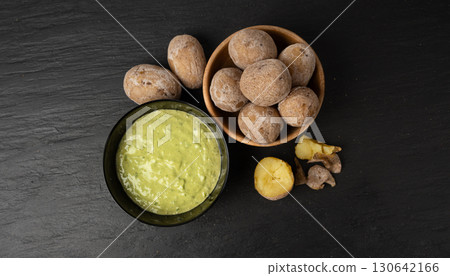Red mojo rojo and green mojo verde sauces, traditional Tenerife dips, mojo picon dressing Red mojo rojo and green mojo verde sauces, traditional Tenerife dips, mojo picon dressing 130642166