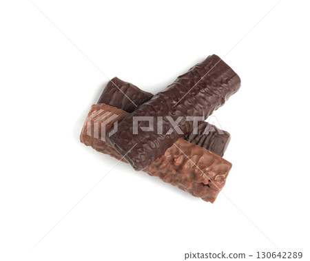 Protein bar isolated, chocolate energy paleo snack, healthy cereal nutrition with nuts, fruits, muesli Protein bar isolated, chocolate energy paleo snack, healthy cereal nutrition with nuts, fruits, muesli 130642289