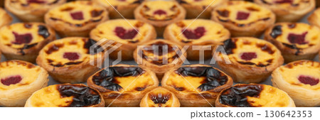 Pastel de nata Portuguese cakes. Traditional Portugal egg tart, fresh pasteis bakery Pastel de nata Portuguese cakes. Traditional Portugal egg tart, fresh pasteis bakery 130642353