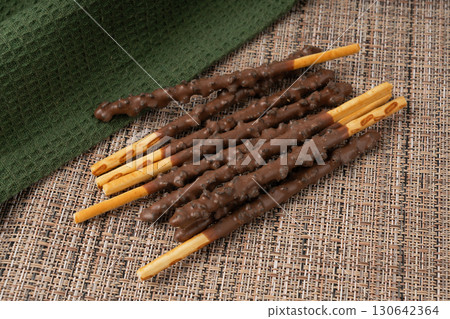 Chocolate cookie sticks, long choco pastries, japan biscuit tubes, korea cracker sticks 130642364