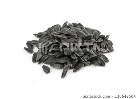Sunflower seeds pile isolated, black oil sun flower grains group with shell, fresh edible oil seeds heap Sunflower seeds pile isolated, black oil sun flower grains group with shell, fresh edible oil seeds heap 130642504
