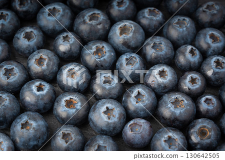 Blueberry texture background. Fresh blue berry fruits pattern, bilberry wallpaper with copy space 130642505