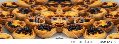 Pastel de nata Portuguese cakes. Traditional Portugal egg tart, fresh pasteis bakery Pastel de nata Portuguese cakes. Traditional Portugal egg tart, fresh pasteis bakery 130642510